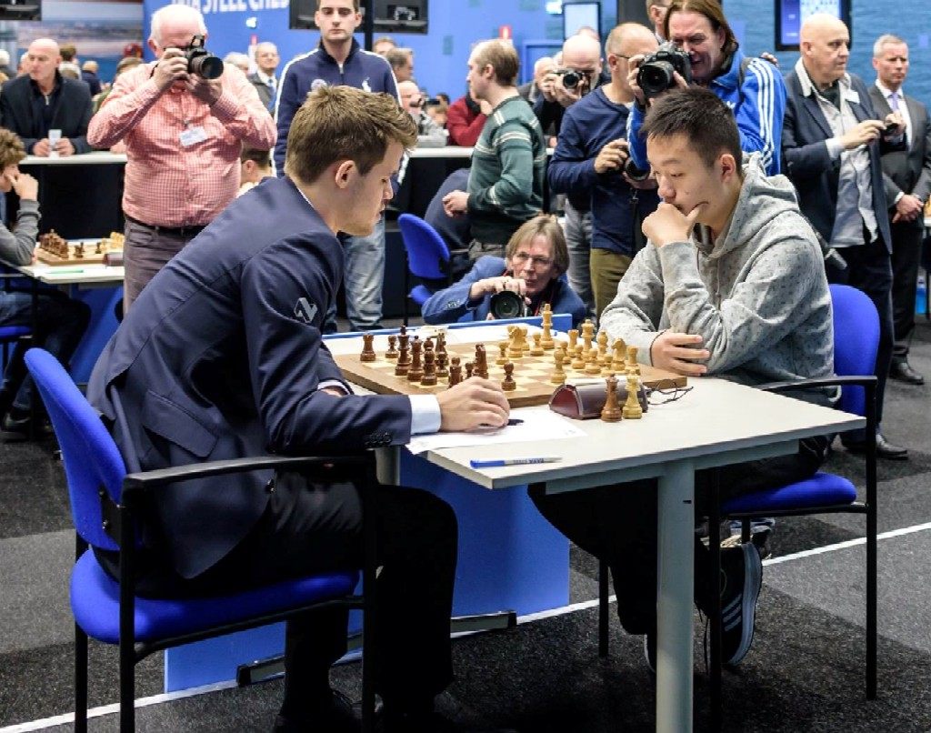 Remis i frste mte mellom Carlsen og Yi Wei.