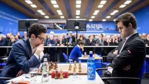 Caruana og Carlsen spilte remis i første runde